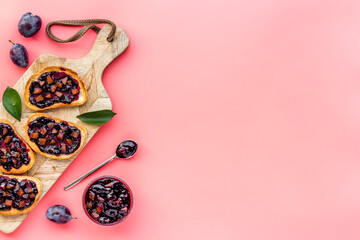 Toasted bread with plump jam. Food layout top view