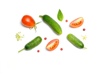 cucumbers and tomatoes and peppers on a white background