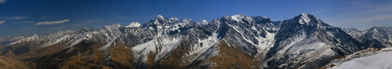 Caucasus, Ossetia. Kurtat gorge. Panorama of the peaks of the Lateral Ridge.