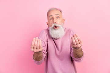 Photo of angry grey hair mature man ask money wear pink sweater isolated on pastel color background