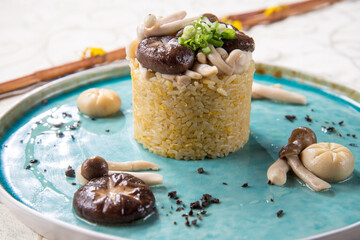 chinese banquet vegetable egg fried rice with assorted mushroom asian vegan halal menu in blue plate