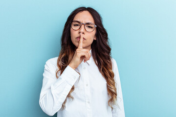 Young mexican woman isolated on blue background thinking and looking up, being reflective, contemplating, having a fantasy.