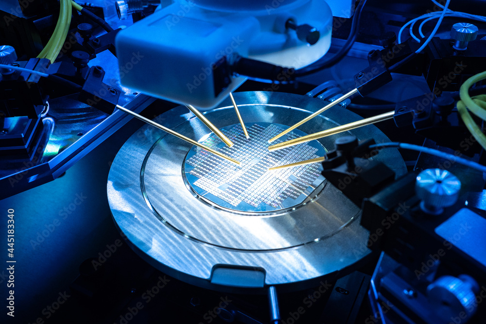 Poster pcb production. close up of examining of test sample of microchip transistor under microscope in lab