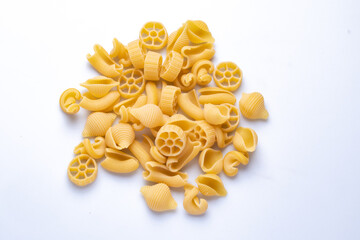 raw pasta on a white background Top view.