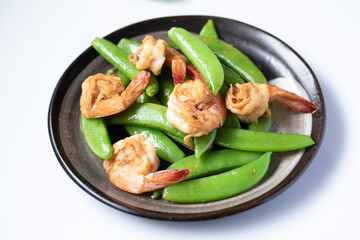 Shrimp stir and fried and green peas