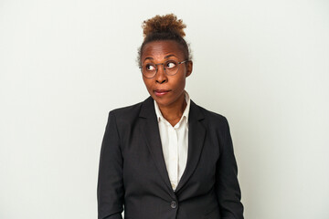 Young business african american woman isolated on white background confused, feels doubtful and unsure.