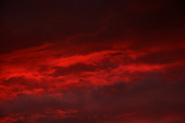 Red sunset sky with dramatic clouds
