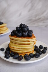 Pancakes with blueberries. Berries. American pancakes.