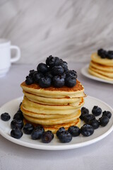Pancakes with blueberries. Berries. American pancakes.