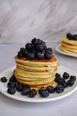 Pancakes with blueberries. Berries. American pancakes.