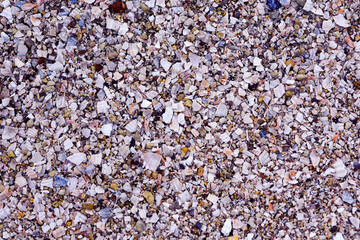 shore texture, blue, orange, beige, red and white pebbles and shells