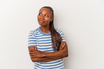 Young african american woman isolated on white background dreaming of achieving goals and purposes