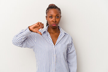 Young african american woman isolated on white background showing a dislike gesture, thumbs down....