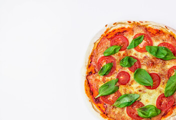 freshly baked Italian pizza with cheese and tomato sauce, garnished with basil leaves. ingredients with signatures. top view 
