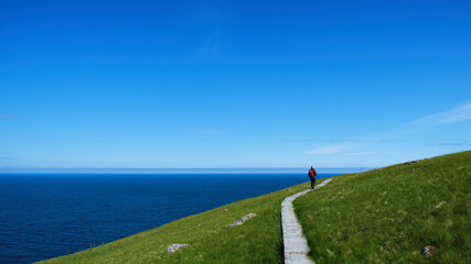 Walker on Handa Island in the Highlands