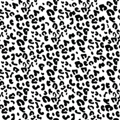 Seamless leopard fur pattern. Fashionable wild leopard print background. Modern panther animal fabric textile print design. Stylish black and white illustration
