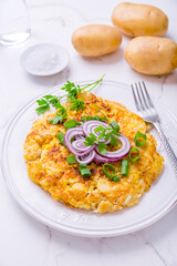 Tortilla - spanish omelet with potatoes, onions and herbs