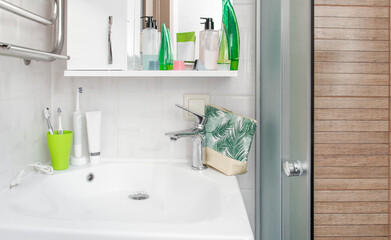 small bathroom with white vanity toilet and mirror against plain wall