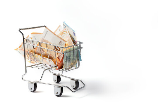 Euro banknotes in a trolley on a white background. Concept. High quality photo