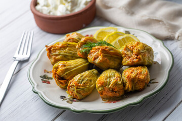 Traditional delicious Turkish - Greek cuisine, Turkish food; Stuffed zucchini flowers (Turkish name; kabak cicegi dolmasi)