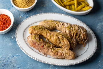 Traditional Turkish Stuffed rice tripe or offal food on the table in Turkish Restaurant. Shirdan Dolma is the favorite food Adana city of Turkey. (Turkish name; Sirdan)