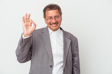 Middle aged indian business man isolated on white background cheerful and confident showing ok gesture.