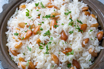 Traditional delicious Turkish food; Almond rice pilaf (Turkish name; Bademli pirinc pilavi)