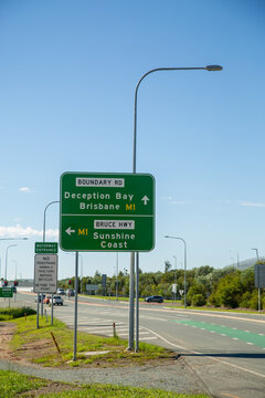 Road signs for M1 Bruce Highway.