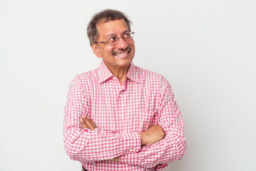 Middle aged indian man isolated on white background smiling confident with crossed arms.