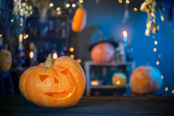 Halloween pumpkins on old wooden table on background Halloween decorations