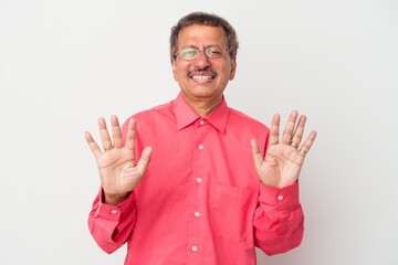Middle aged indian man isolated on white background rejecting someone showing a gesture of disgust.