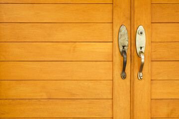 stainless door knob or handle on wooden door