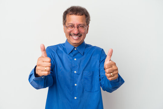 Middle Aged Indian Man Isolated On White Background Smiling And Raising Thumb Up