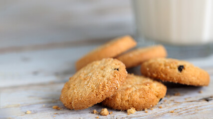 Brown cookies on a vintage wooden background