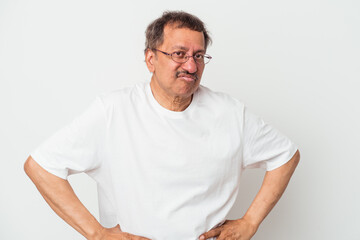 Middle aged indian man isolated on white background sad, serious face, feeling miserable and displeased.