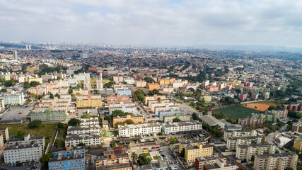 Fototapeta na wymiar Aerial view of Itaquera, Sao Paulo. Residential buildings, avenues and train