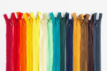 multicolored zippers for sewing, close-up