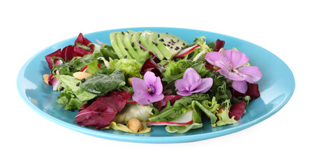 Fresh spring salad with flowers in plate isolated on white
