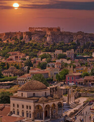 Acropolis of Athens, Monastiraki square and Plaka old neighborhood under impressive sky, Greece
