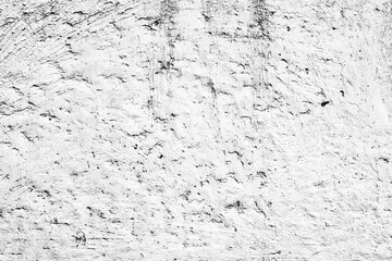 Texture of a concrete wall with cracks and scratches which can be used as a background