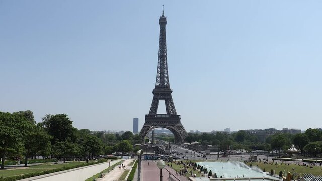 Eiffel Tower fountain opened for bath during a heat wave in Paris summer.