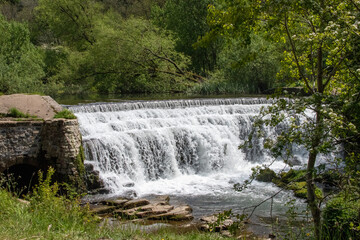Monsal Dale Weir waterfall in Derbyshire, UK