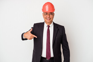 Senior american arquitech man isolated on white background person pointing by hand to a shirt copy space, proud and confident