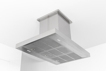 Modern Cooker hood of a minimalist kitchen. Low angle view