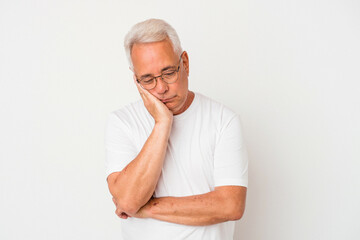 Senior american man isolated on white background who is bored, fatigued and need a relax day.