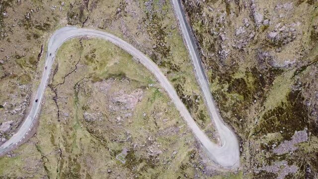 4k drone footage of the narrow winding mountain road at Bealach na Ba near Applecross in the Scottish Highlands, UK