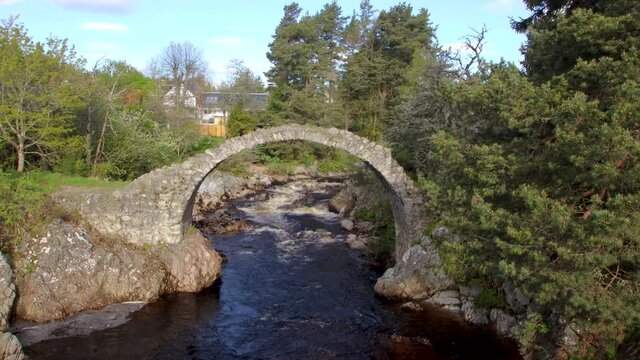 4k footage of the Old Pack Horse Bridge in Carrbridge, Scottish Highlands, UK