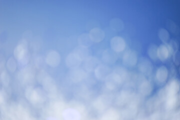Bokeh in blue and white colors. Abstract background.	