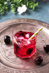 Cold sweet cherry non alcohol drink with ice