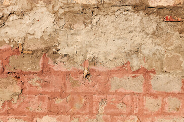 Textured surface of an old weathered concrete wall